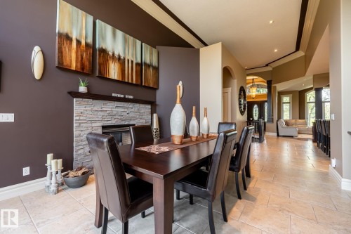 7620 98A Avenue, Edmonton, AB - Indoor Photo Showing Dining Room With Fireplace