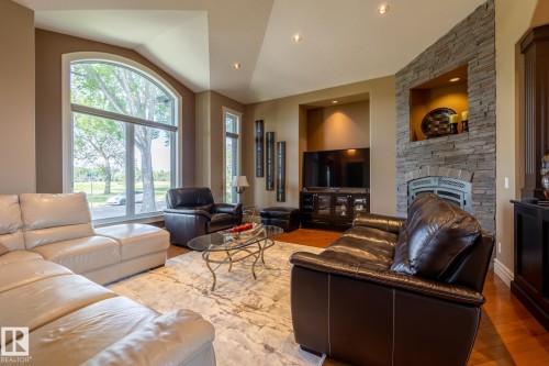 7620 98A Avenue, Edmonton, AB - Indoor Photo Showing Living Room With Fireplace