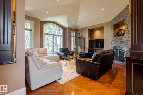 7620 98A Avenue, Edmonton, AB - Indoor Photo Showing Living Room With Fireplace