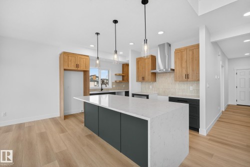 7087 Kiviaq Crescent, Edmonton, AB - Indoor Photo Showing Kitchen With Upgraded Kitchen