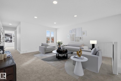7087 Kiviaq Crescent, Edmonton, AB - Indoor Photo Showing Living Room