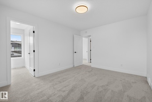 7087 Kiviaq Crescent, Edmonton, AB - Indoor Photo Showing Other Room