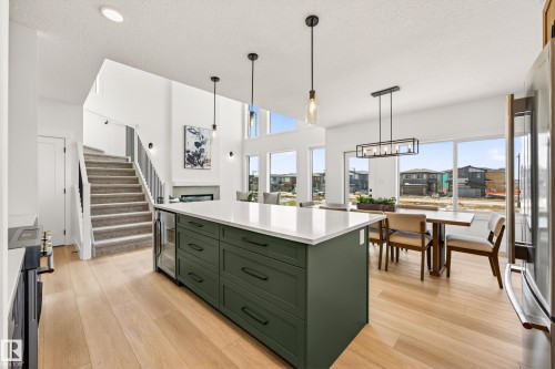 7087 Kiviaq Crescent, Edmonton, AB - Indoor Photo Showing Kitchen With Upgraded Kitchen