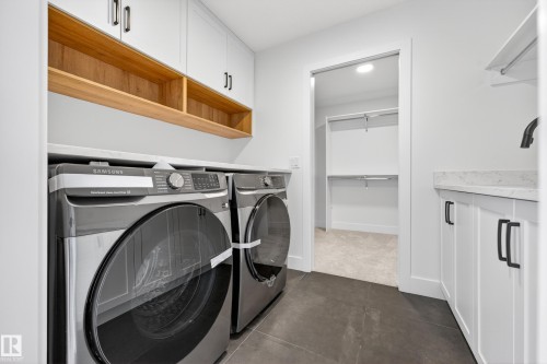 7087 Kiviaq Crescent, Edmonton, AB - Indoor Photo Showing Laundry Room