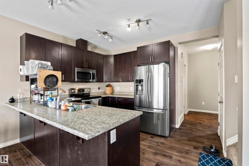 2526 19A Avenue Nw, Edmonton, AB - Indoor Photo Showing Kitchen With Stainless Steel Kitchen With Double Sink With Upgraded Kitchen