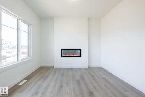 610 Ashgrove Circle, Leduc, AB - Indoor With Fireplace