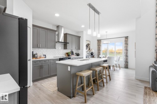15772 7 Street Ne, Edmonton, AB - Indoor Photo Showing Kitchen With Double Sink With Upgraded Kitchen