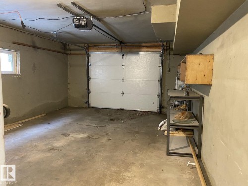 7921 97 Avenue, Edmonton, AB - Indoor Photo Showing Garage