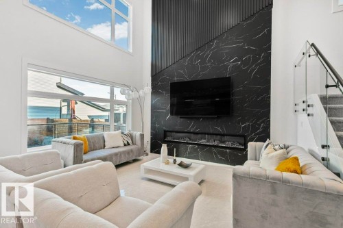 2942 Kostash Drive, Edmonton, AB - Indoor Photo Showing Living Room With Fireplace