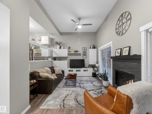 21 Glaewyn Estates, St. Albert, AB - Indoor Photo Showing Living Room With Fireplace