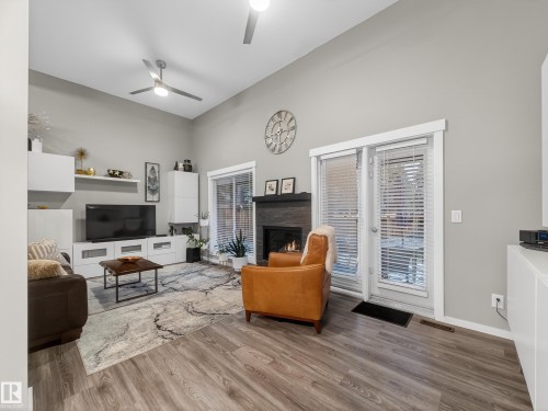21 Glaewyn Estates, St. Albert, AB - Indoor Photo Showing Living Room With Fireplace