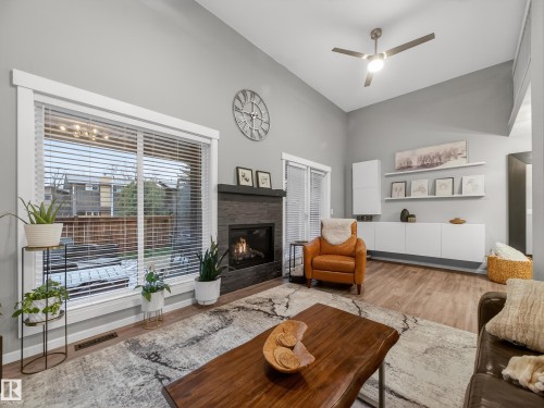 21 Glaewyn Estates, St. Albert, AB - Indoor Photo Showing Living Room With Fireplace