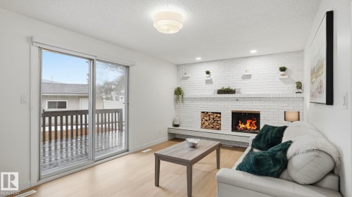 2011 89 Street, Edmonton, AB - Indoor Photo Showing Living Room With Fireplace