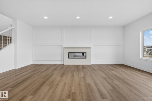 7091 Kiviaq Crescent, Edmonton, AB - Indoor With Fireplace