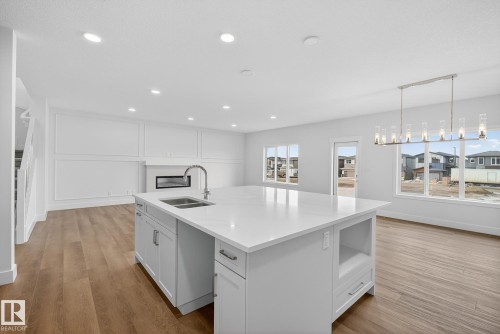 7091 Kiviaq Crescent, Edmonton, AB - Indoor Photo Showing Kitchen With Double Sink With Upgraded Kitchen