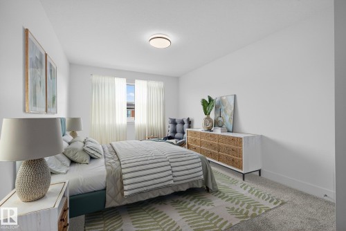 7091 Kiviaq Crescent, Edmonton, AB - Indoor Photo Showing Bedroom