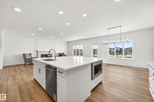 7091 Kiviaq Crescent, Edmonton, AB - Indoor Photo Showing Kitchen With Double Sink With Upgraded Kitchen