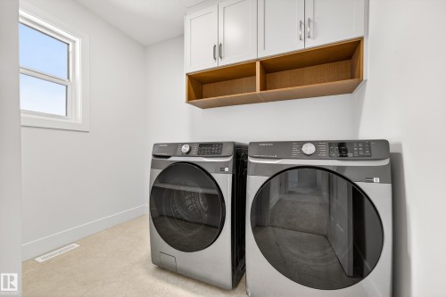7091 Kiviaq Crescent, Edmonton, AB - Indoor Photo Showing Laundry Room
