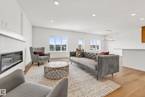 7091 Kiviaq Crescent, Edmonton, AB - Indoor Photo Showing Living Room With Fireplace