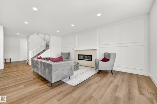 7091 Kiviaq Crescent, Edmonton, AB - Indoor With Fireplace