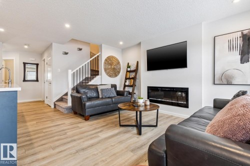 9317 Pear Link Link, Edmonton, AB - Indoor Photo Showing Living Room With Fireplace