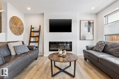 9317 Pear Link Link, Edmonton, AB - Indoor Photo Showing Living Room With Fireplace