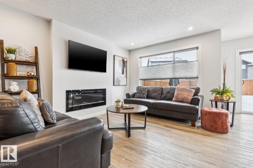 9317 Pear Link Link, Edmonton, AB - Indoor Photo Showing Living Room With Fireplace