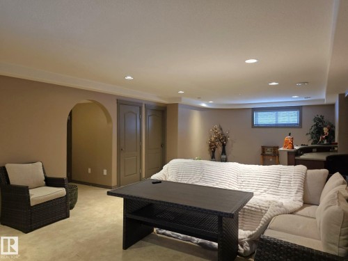The property features a spacious living area with recessed lighting and neutral-toned walls - 4477 36 Street, Drayton Valley, AB - Indoor