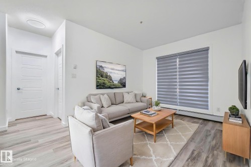 119 320 Ambleside Link Link, Edmonton, AB - Indoor Photo Showing Living Room