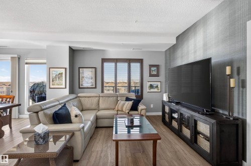 401 1316 Windermere Way, Edmonton, AB - Indoor Photo Showing Living Room