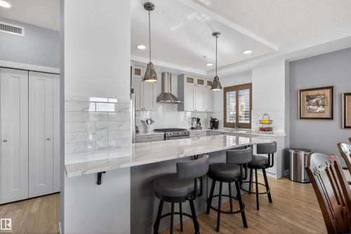 401 1316 Windermere Way, Edmonton, AB - Indoor Photo Showing Kitchen With Upgraded Kitchen