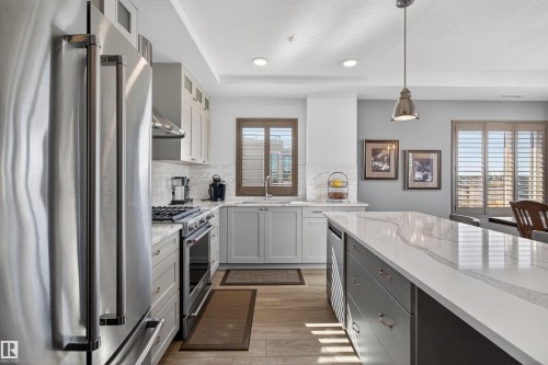 401 1316 Windermere Way, Edmonton, AB - Indoor Photo Showing Kitchen With Upgraded Kitchen
