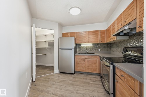 1910 10149 Saskatchewan Drive, Edmonton, AB - Indoor Photo Showing Kitchen