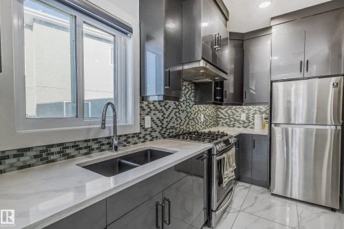 1448 25 Street, Edmonton, AB - Indoor Photo Showing Kitchen With Double Sink With Upgraded Kitchen