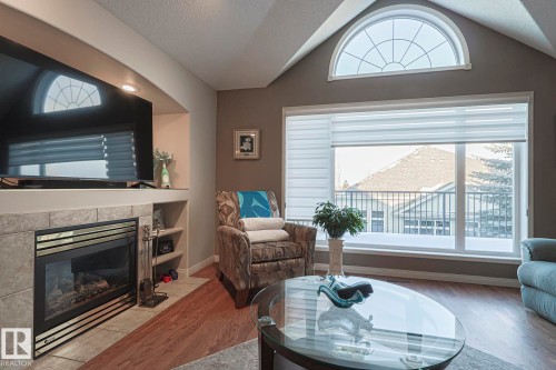 32 600 Regency Drive, Sherwood Park, AB - Indoor Photo Showing Living Room With Fireplace