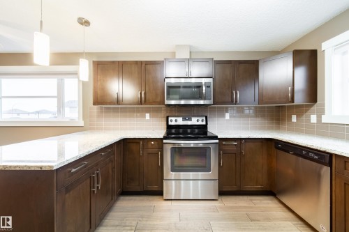 122 401 Southfork Drive, Leduc, AB - Indoor Photo Showing Kitchen With Stainless Steel Kitchen