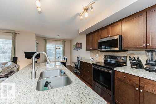 2423 Casselman Crescent, Edmonton, AB - Indoor Photo Showing Kitchen With Double Sink
