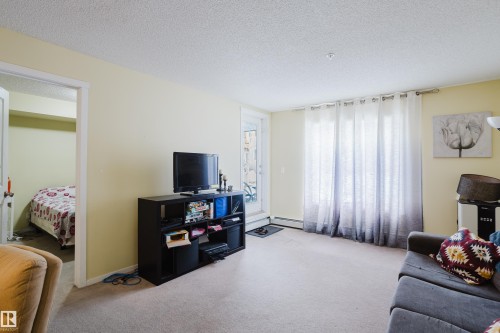 119 1510 Watt Drive, Edmonton, AB - Indoor Photo Showing Living Room