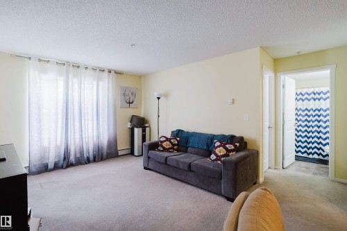 119 1510 Watt Drive, Edmonton, AB - Indoor Photo Showing Living Room