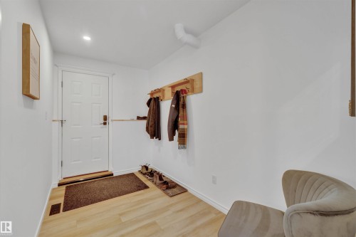 Entryway featuring light-toned flooring, white walls, and recessed lighting - 131 West Liberty Crescent, Millet, AB - Indoor Photo Showing Other Room