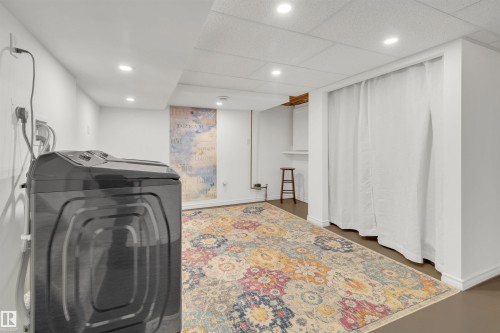 Utility space with recessed lighting and a colorful area rug - 131 West Liberty Crescent, Millet, AB - Indoor Photo Showing Laundry Room