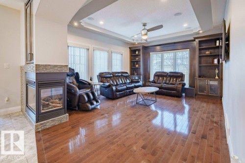 6111 56 Avenue, Beaumont, AB - Indoor Photo Showing Living Room With Fireplace