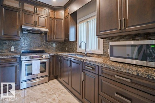 6111 56 Avenue, Beaumont, AB - Indoor Photo Showing Kitchen With Double Sink With Upgraded Kitchen
