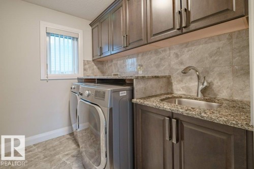 6111 56 Avenue, Beaumont, AB - Indoor Photo Showing Laundry Room