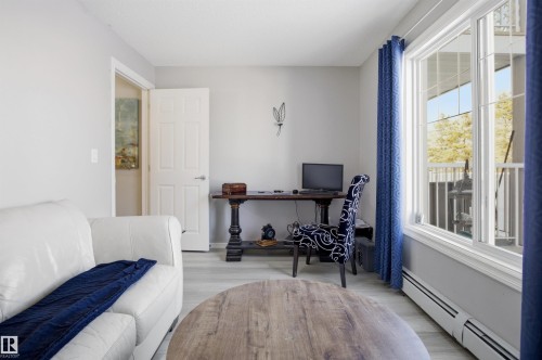 The property features light-colored walls and flooring, offering a bright and inviting atmosphere - 115 2208 44 Avenue, Edmonton, AB - Indoor