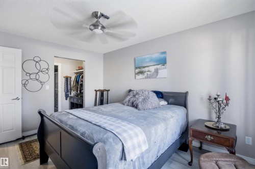 This room features a ceiling fan, light-colored walls, and flooring - 115 2208 44 Avenue, Edmonton, AB - Indoor Photo Showing Bedroom