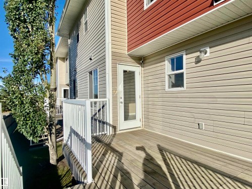 View of wooden terrace - 403 178 Bridgeport Boulevard, Leduc, AB - Outdoor With Deck Patio Veranda With Exterior