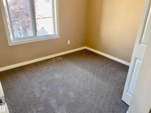 Bedroom #2 - 403 178 Bridgeport Boulevard, Leduc, AB - Indoor Photo Showing Other Room