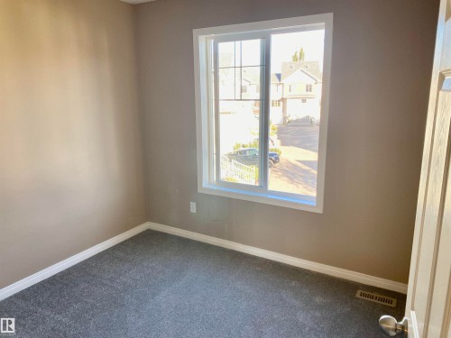 Bedroom #3 - 403 178 Bridgeport Boulevard, Leduc, AB - Indoor Photo Showing Other Room