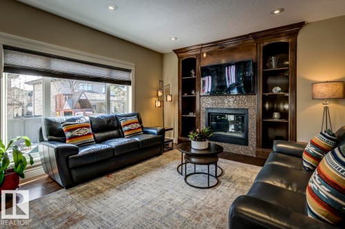 1005 Downey Way, Edmonton, AB - Indoor Photo Showing Living Room With Fireplace